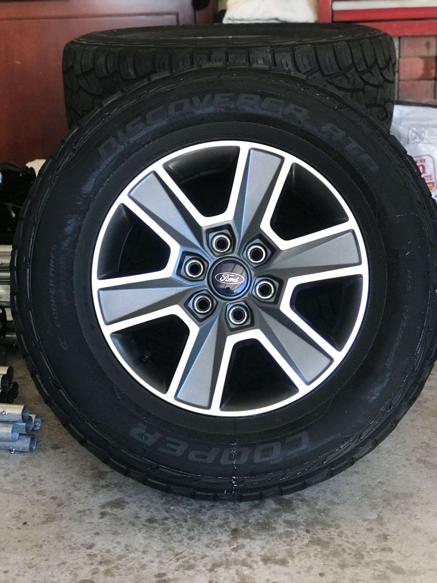 4 Used Ford factory 18” six-spoke mach-alum wheel w/ 275/65R18 Cooper Discovery ATP wheels