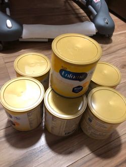 Infant formula yellow cans
