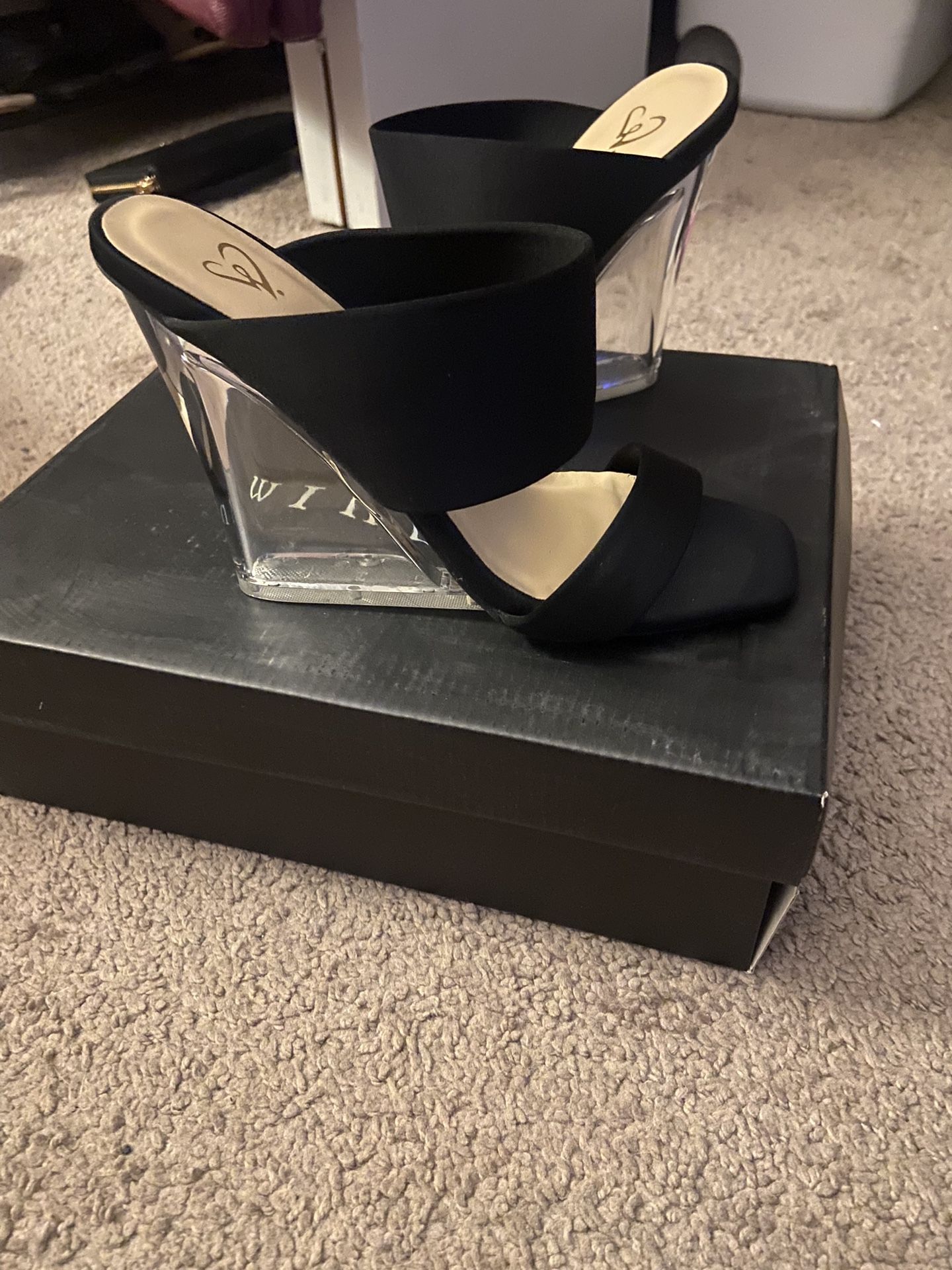 Woman’s Wedge Clear Heels 