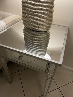 A Set Of Two Side Tables