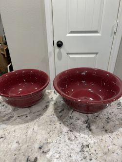 Fiesta. Two maroon mixing or serving bowls measure 9 x 4 and 8 x 4