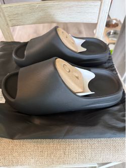 Yeezy Slide Black Size 10 and size 11
