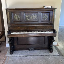 Piano with real Ivory keys