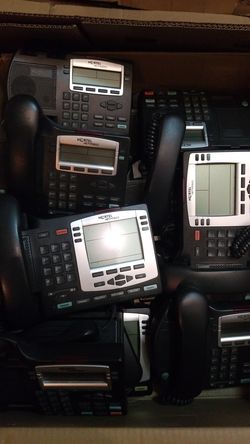 Box of Nortel/ Mitel VOIP phones