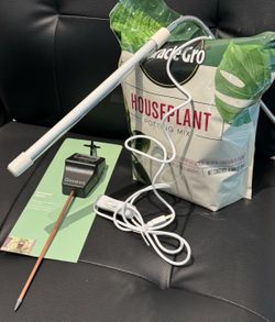 Grow light, water meter, soil