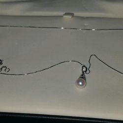 Diamond And Pearl Pendant