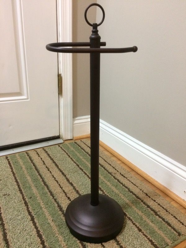 Rubbed bronze toilet paper stand