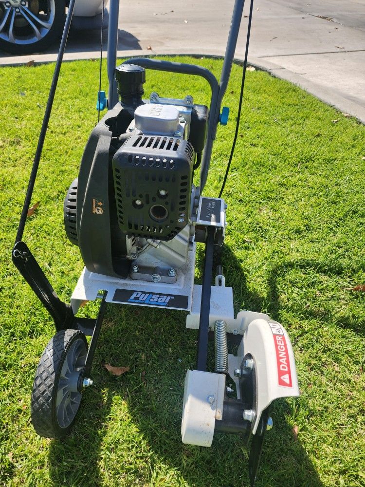 Pulsar 150cc Gas Powered 4-
Cycle Walk Behind Lawn Edge