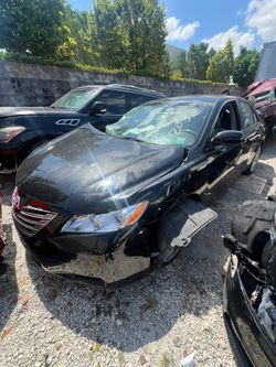 2009 Toyota Camry hybrid parts battery axels suspension rims radio cluster