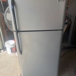 Apartment size stainless steel refrigerator will deliver and install