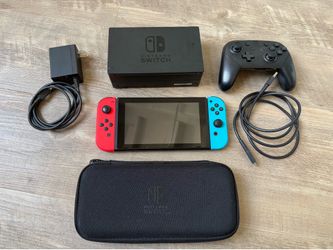 Nintendo Switch (first gen) with pro controller and travel case