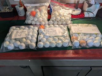 Golf balls and air thru practice golf balls