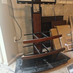 Entertainment Stand - Wooden With Black Glass Shelfs