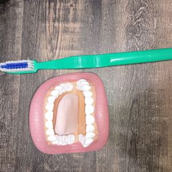 Toothbrush and puppet mouth set