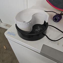 Ying Yang Pet Feeder $5