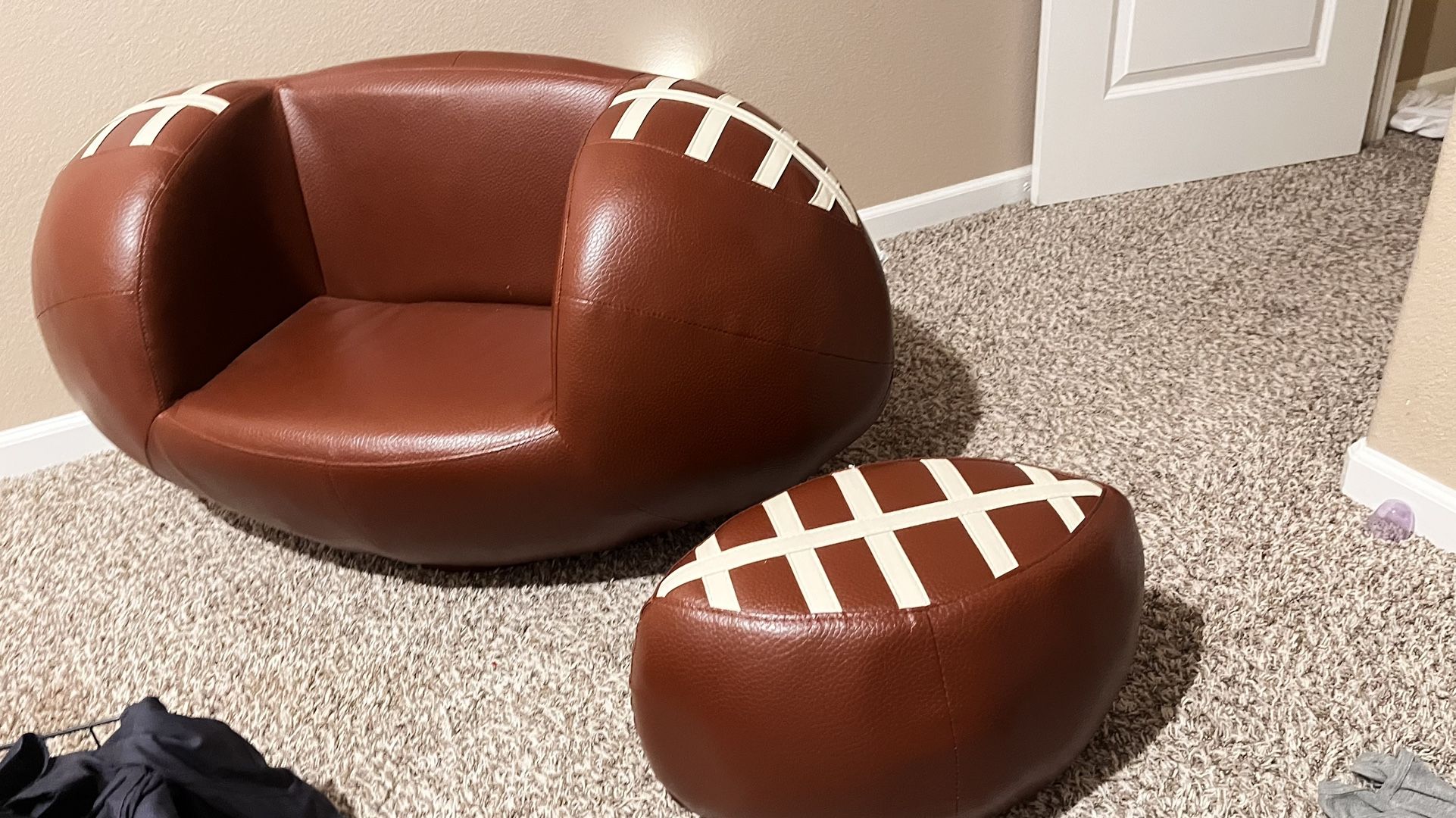 Football Couch For Little Kids. Has Foot Stool. Really Heavy. $80 OBO Comes With Curtains And A Rug