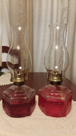 2 antique oil lamps in perfect condition