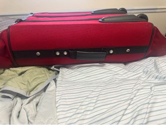 Large red suitcase  American Tourist