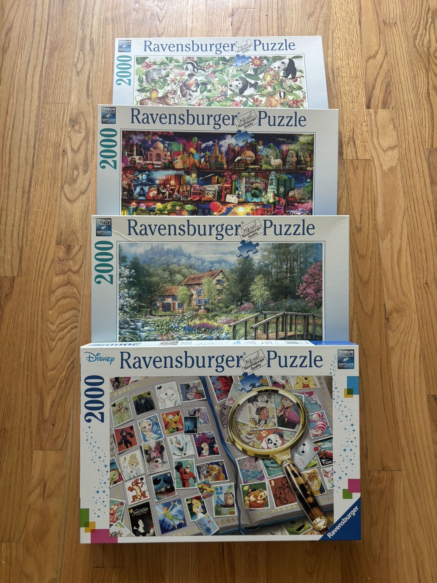 Four 2000 pieces Ravensburger Puzzles 38.5in x 29.5in