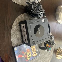 Nintendo GameCube black color one hundred percent original complete with a game of Pac Man Word 2