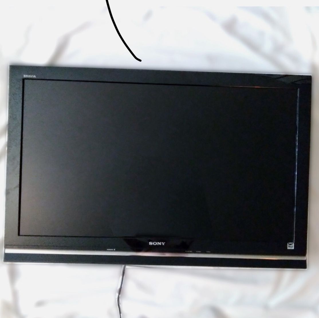 Sony Bravia 52" flat screen TV on base w/remote