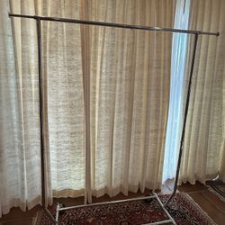 Garment Rack: Metal Frame, Rolling Clothing Storage,