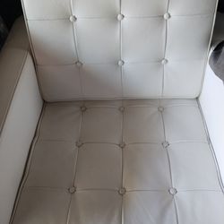 Two White Leather tufted Chairs