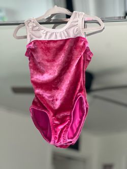 two-tone pink and white crushed velvet gymnastics leotard.