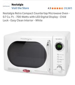 Nostalgia Retro Compact Countertop Microwave Oven  retrowave - 700-Watts with LED Digital Display - Child Lock - Easy Clean Interior - White