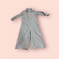 Women’s blue and white striped long-sleeved linen shirt jumpsuit.