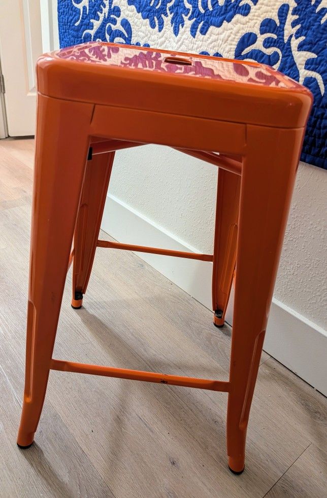 Two Orange Short In Bar Stools