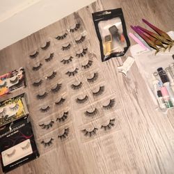 18 pair new lashes & a bunch of different glues W/ a few non stick applicators