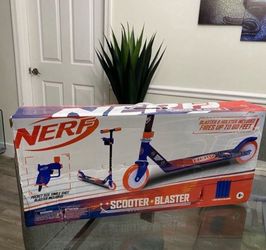 Pretty stuff ! Kids Scooter With Blaster For Game! Brand New ( ask for price)