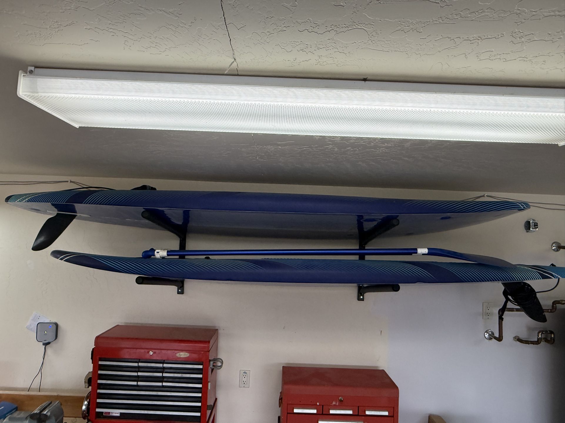 Two 9’6” Wavestorm Paddleboards and rack