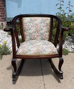 Antique Wooden Barrel Back Rocking Chair with Floral Upholstery