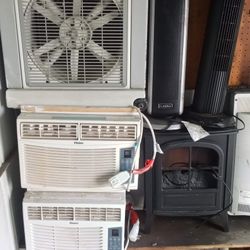 2 AC's Swamp Cooler A Two Tall Standing Fans In A Microwave