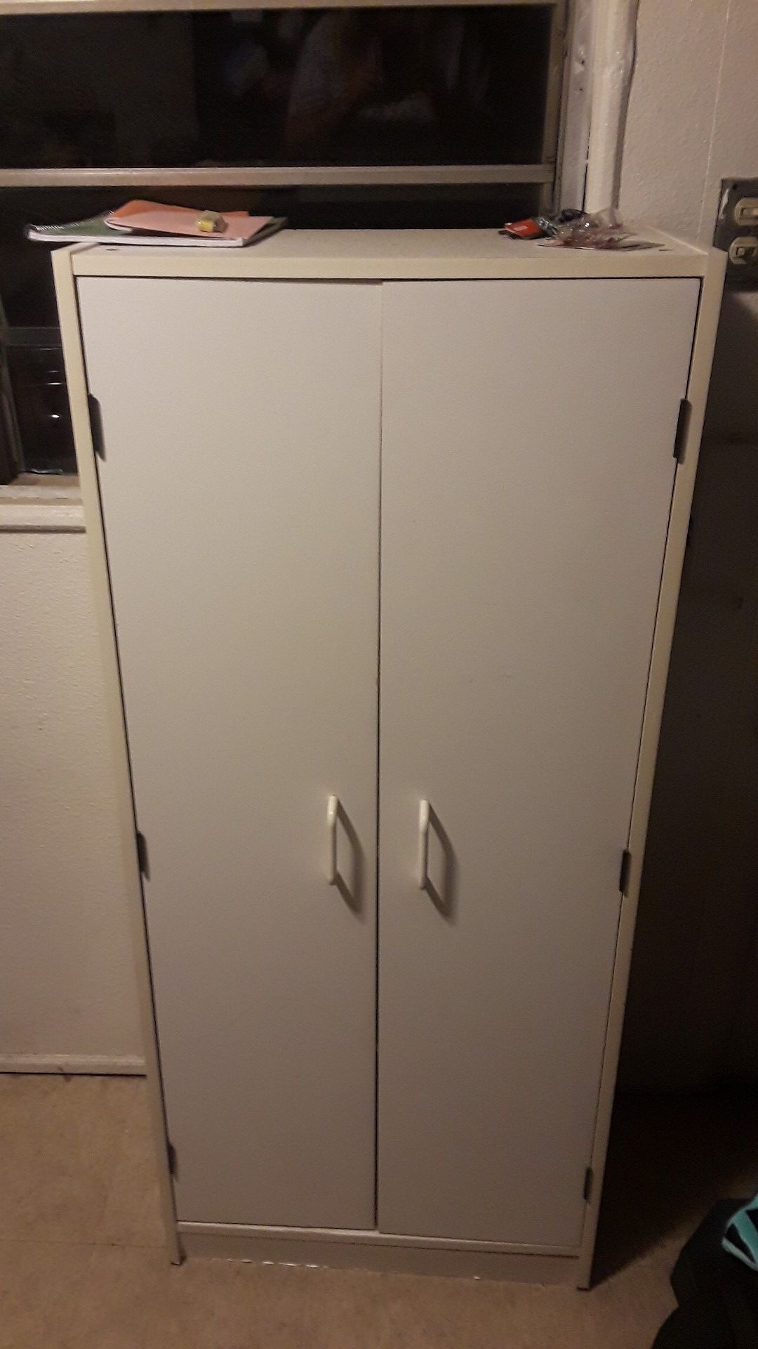 Sm. storage cabinet