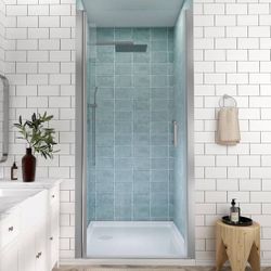 2367 $240 32 to 33-1/4 in. H Pivot Swing Frameless Shower Door in Brushed Nickel with Clear Glass  Model size: 32 to 33-1/4 in. W x 72 in. H Premium 1