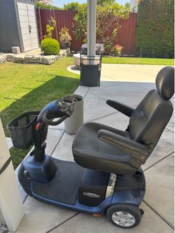 Electric scooter with a charger