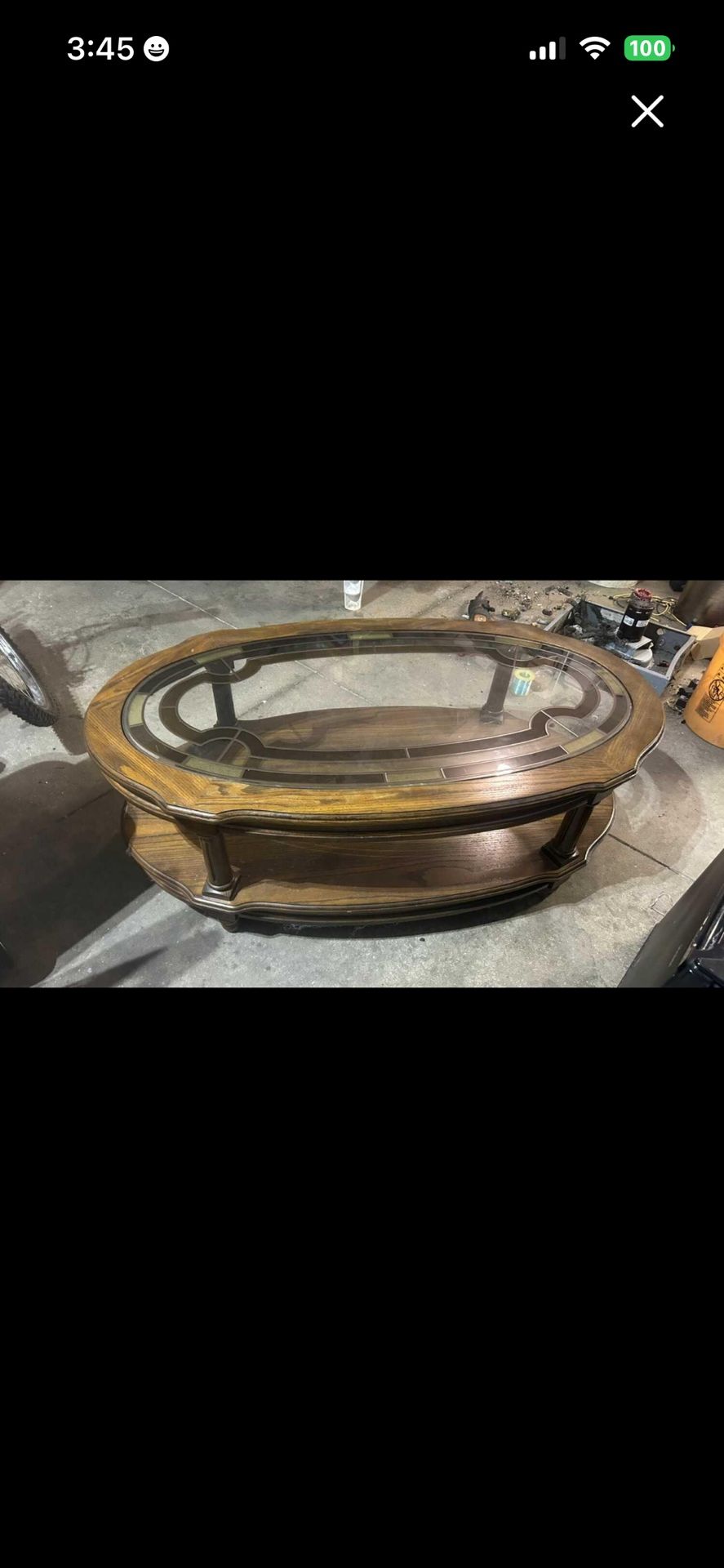 Very nice wood and glass two tier coffee table 45”L 16.6”T 25”W