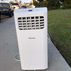 Air Conditioner   portable    not used much  remote control custome made window vent AC