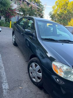 Toyota Corolla Black 4-Door Sedan 2007 Le