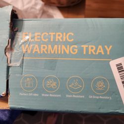 Electric Warmer Tray. New Opened Box