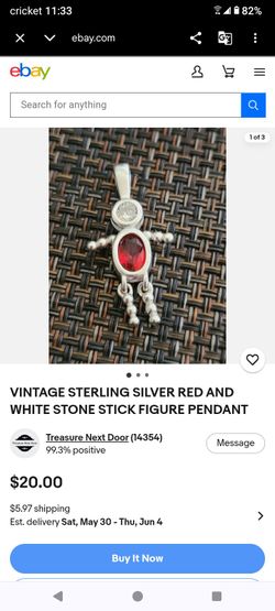 Dije de sterling silver 925 con piedras Blanca's y rojas