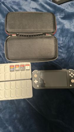 Nintendo switch light with a case. Four games ,fifa 23,fast and furious spy racers,crash team racin nitro fueled,and crash bandicoot 4.