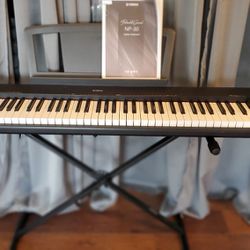 Like New Yamaha NP-30 Portable Grand Piano with Stand, Foot Pedal, and Cord