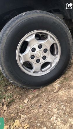 Set of 4 Chevy truck rim and tires