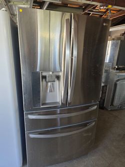 L. Gfour door refrigerator.
Working condition thirty day warranty.Only pick up