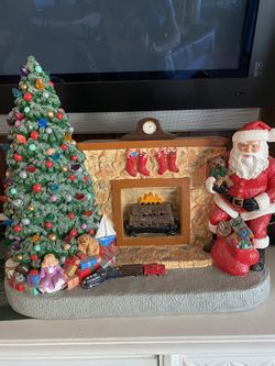 Christmas Tree And Santa By The Fire 