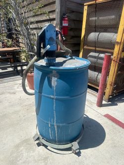 Def 50 gallon drum with hand pump